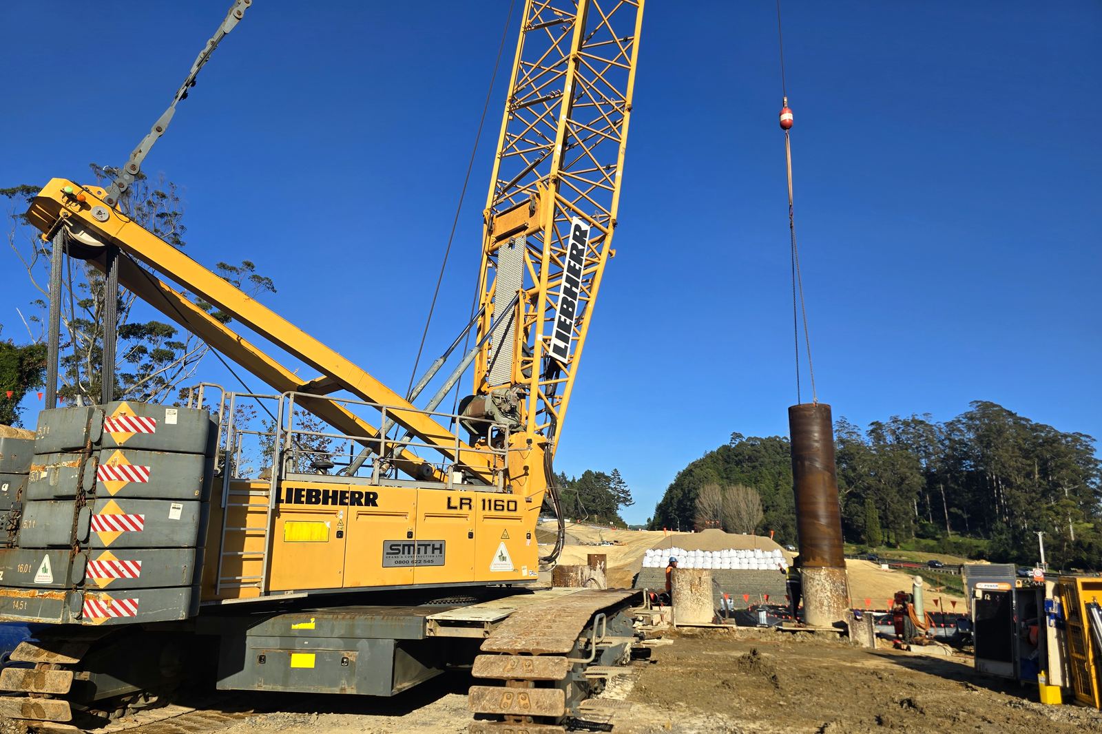 Crawler crane set up for pile driving. June 2026. SH29 Omanawa Bridge Replacement