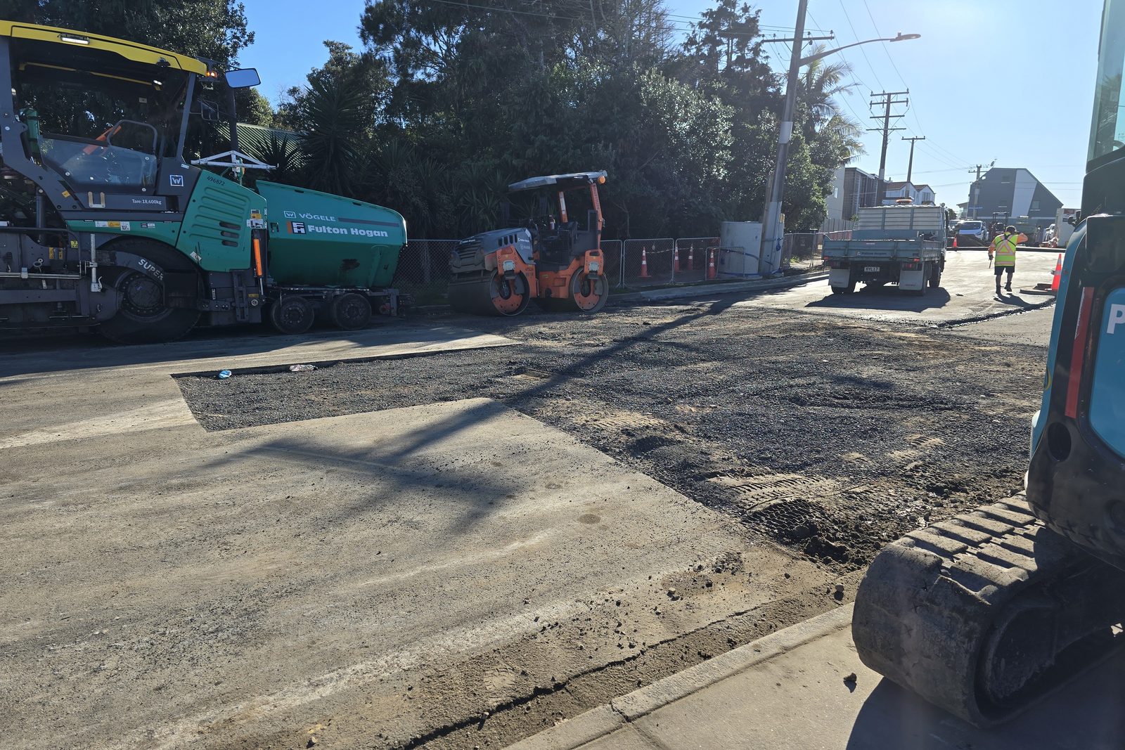 Milled surface and correction layer ahead of the AC20. July 2024. Oceanbeach, Girven and Maranui Intersection Upgrade
